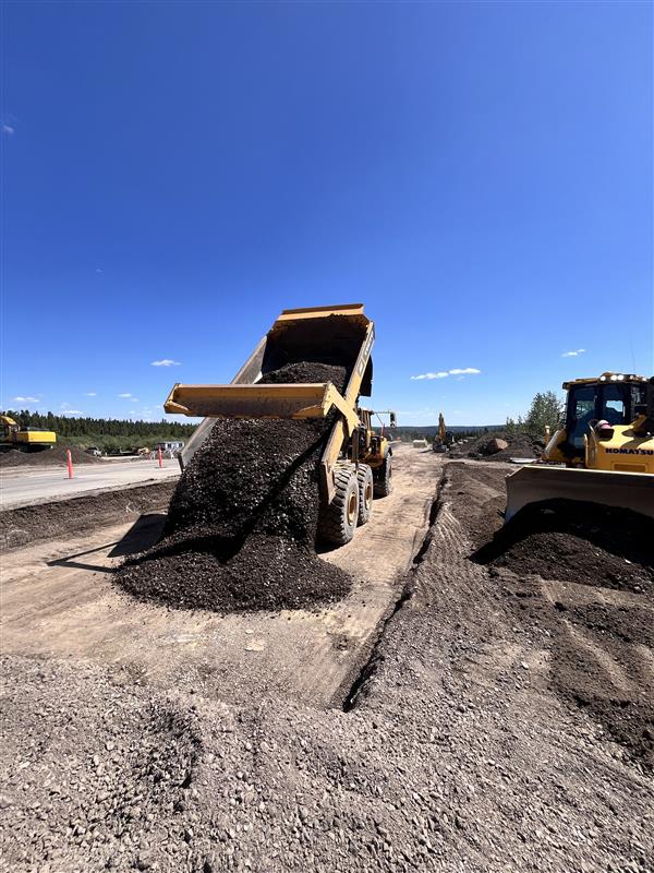 ACL Construction road and intersection improvements rock truck
