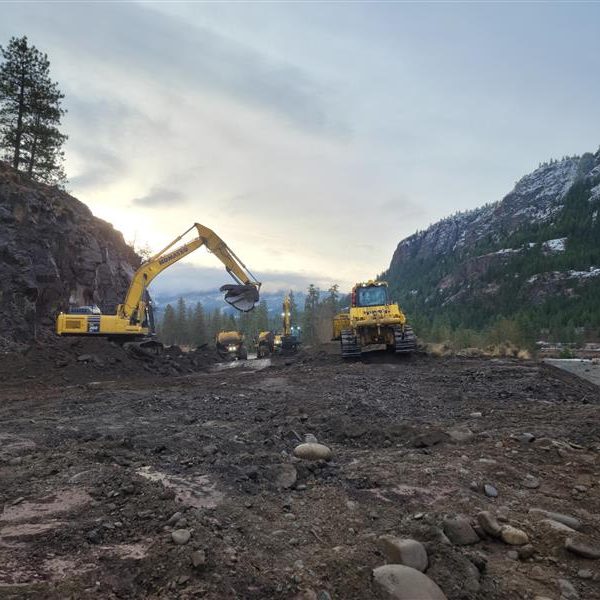 Excavators loading rock ACL Construction Fort St. John Flood Mitigation Repairs Road Repairs