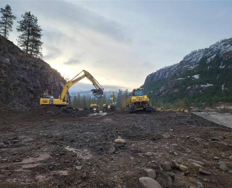 Excavators loading rock ACL Construction Fort St. John Flood Mitigation Repairs Road Repairs