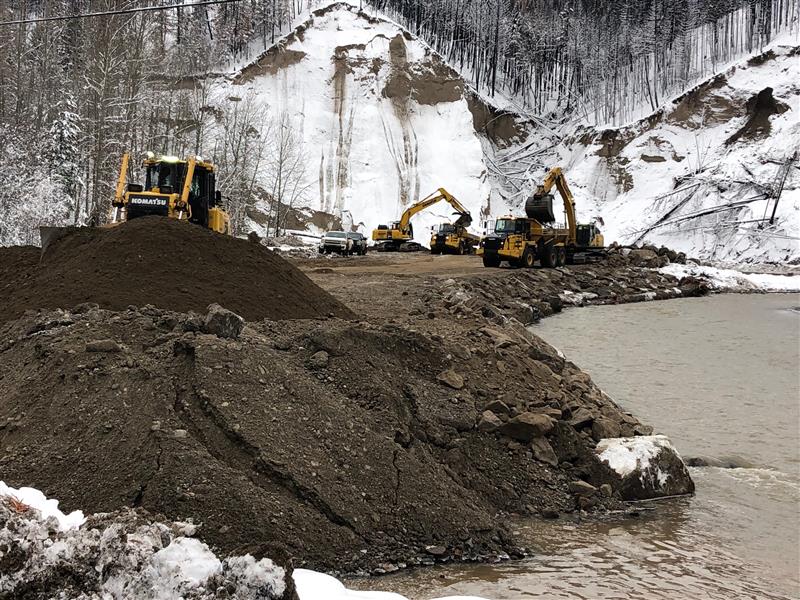 Excavators loading rock ACL Construction Fort St. John Flood Mitigation Repairs