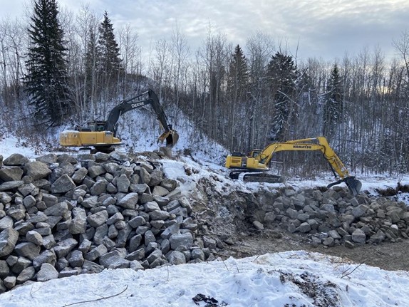 Excavators loading rock ACL Construction Fort St. John