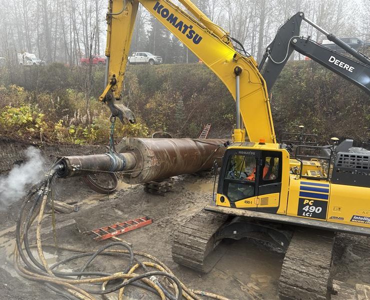 Excavator lifting pipe Meziadin Junction